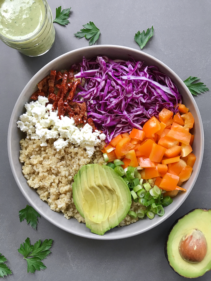 Made with a quinoa base, all the colorful veg, and a parsley-lemon green tahini sauce, this rainbow bowl is an explosion of freshness, texture, and flavor!